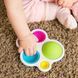 Прорезыватель для зубов и тактильная игрушка Нажми на шар Fat Brain Toys dimpl (F192ML)